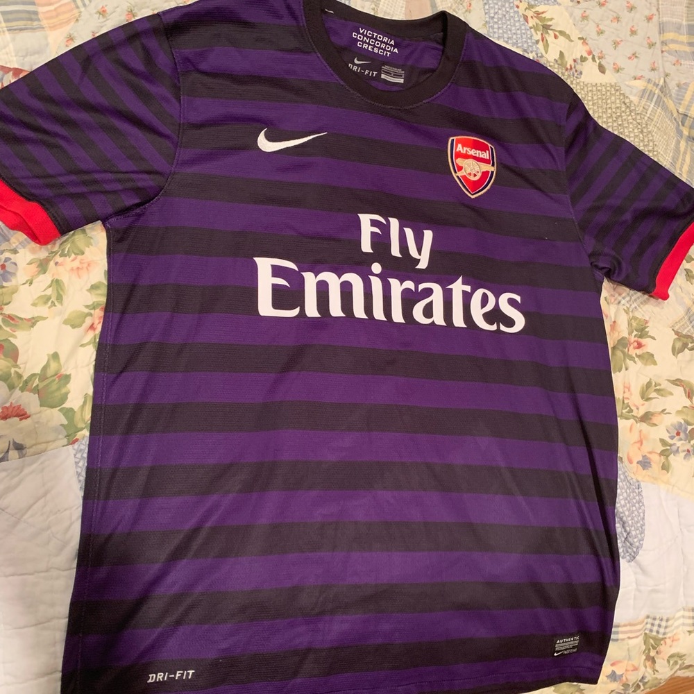 Purple and black Arsenal away jersey